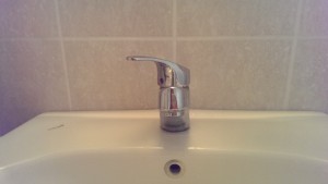 Tap with handle twisted to left